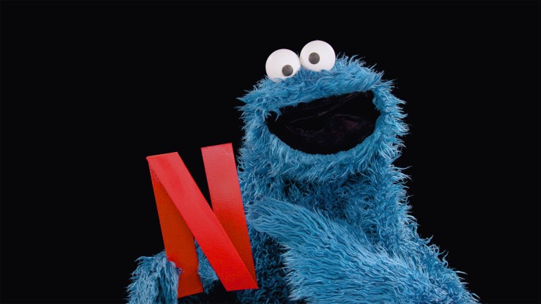 Cookie Monster holding a Netflix "N."