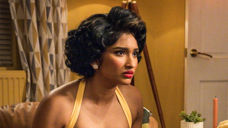 Varada Sethu wearing 1950s clothing sitting holding coffee mugs